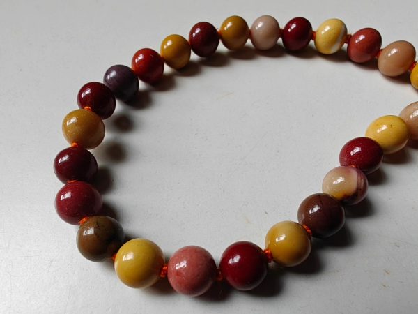 27 bead 8mm Mookaite Jasper Mala on Orange Thread - Image 4