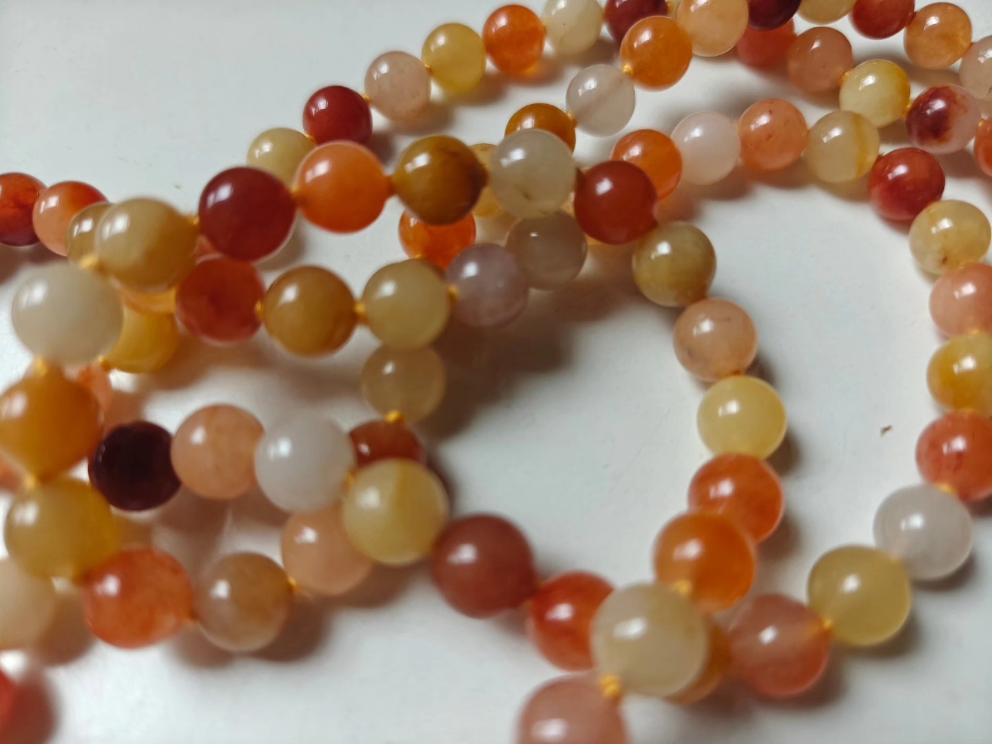 108 bead 8mm Golden Jade Mala on Yellow Thread - Image 4