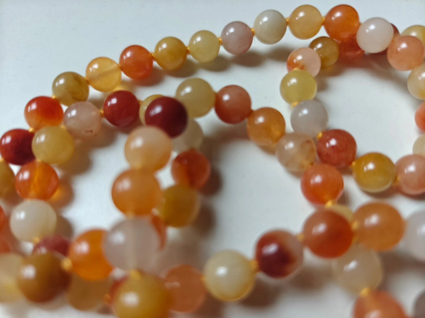 108 bead 8mm Golden Jade Mala on Yellow Thread - Image 3