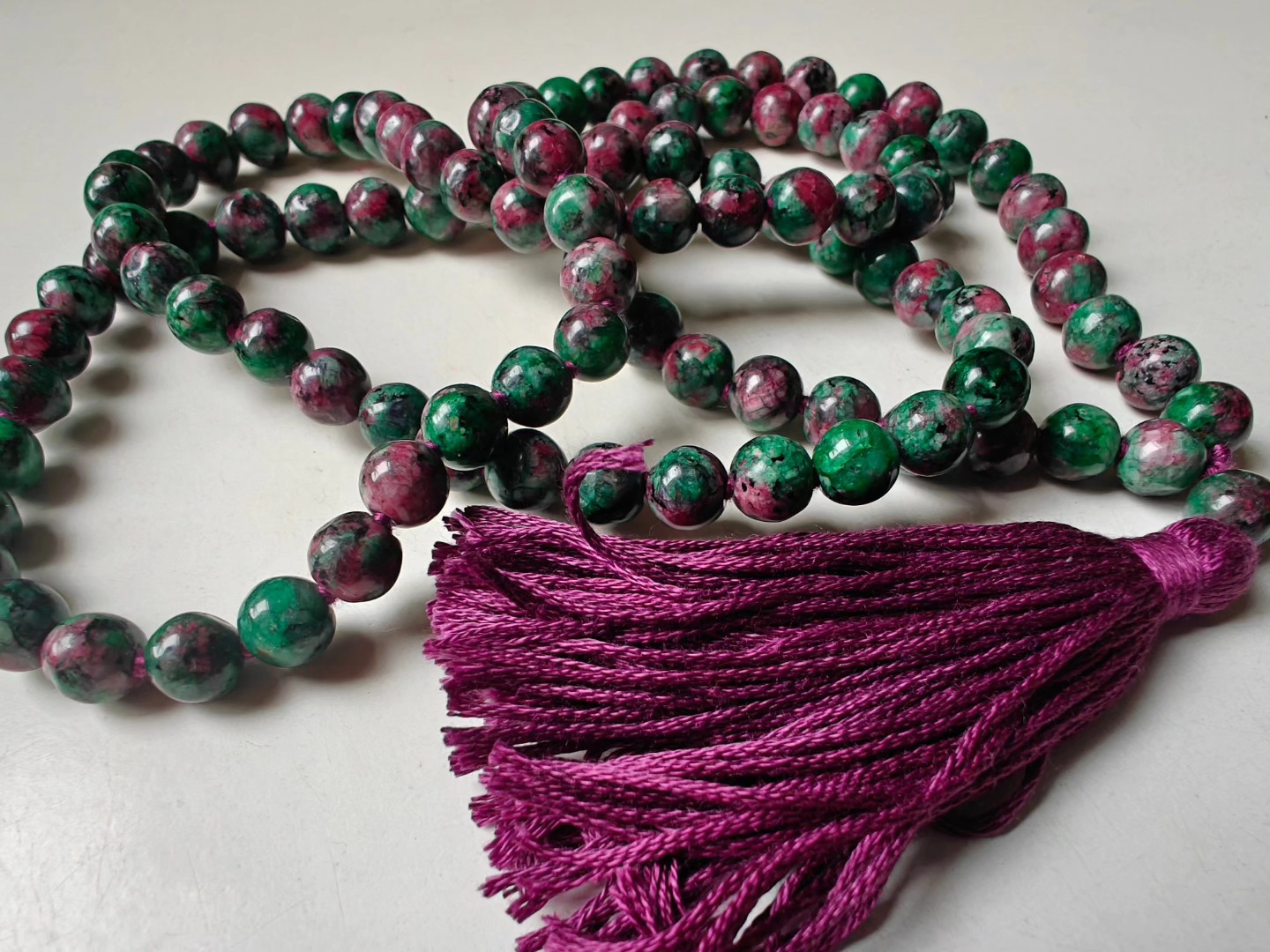 108 bead 8mm Ruby-Zoisite (aka Anyolite) Mala on dark grape coloured thread